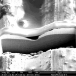 FIB cross-section showed interruption of plating